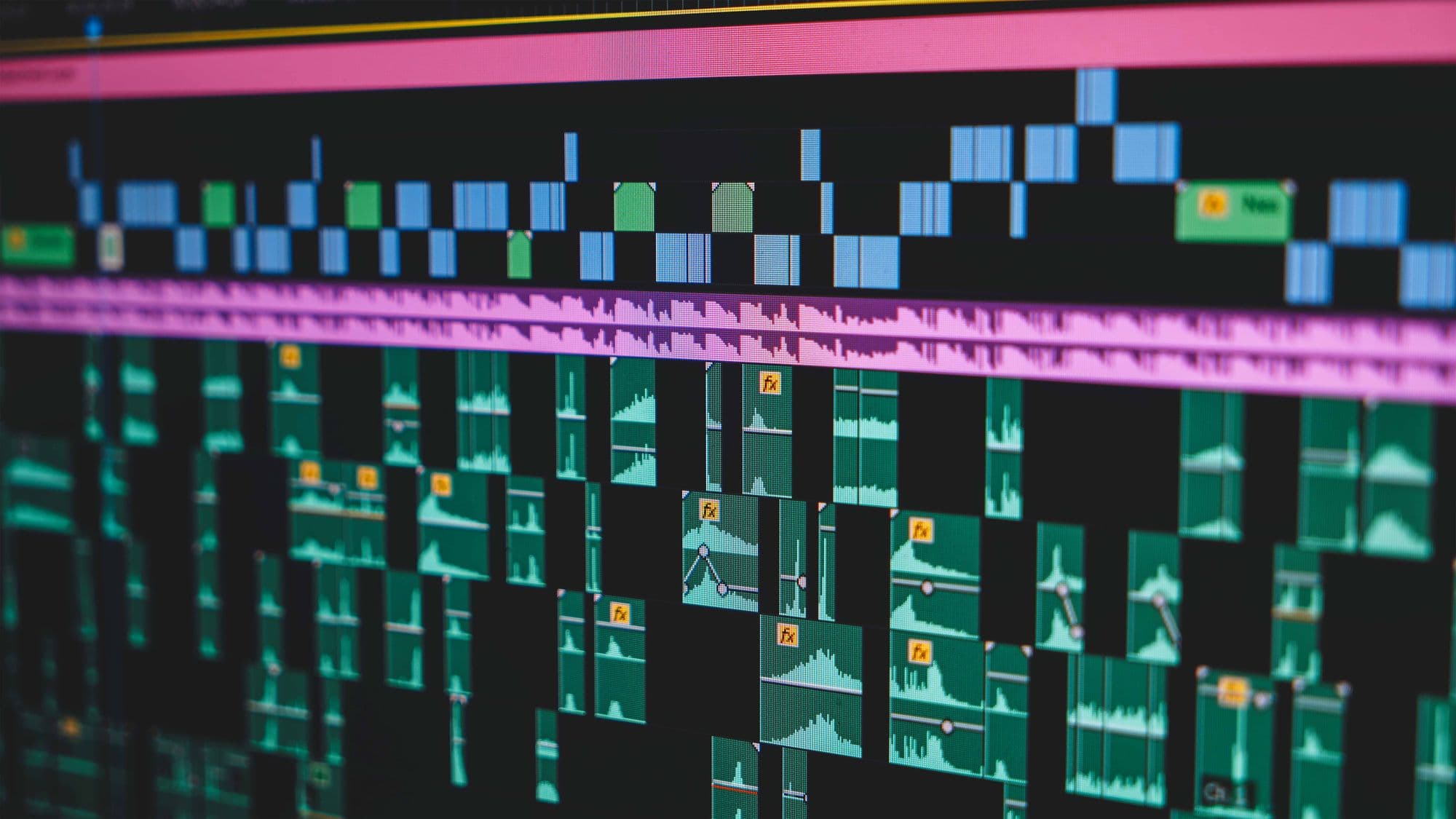 A video editing timeline displayed on a monitor